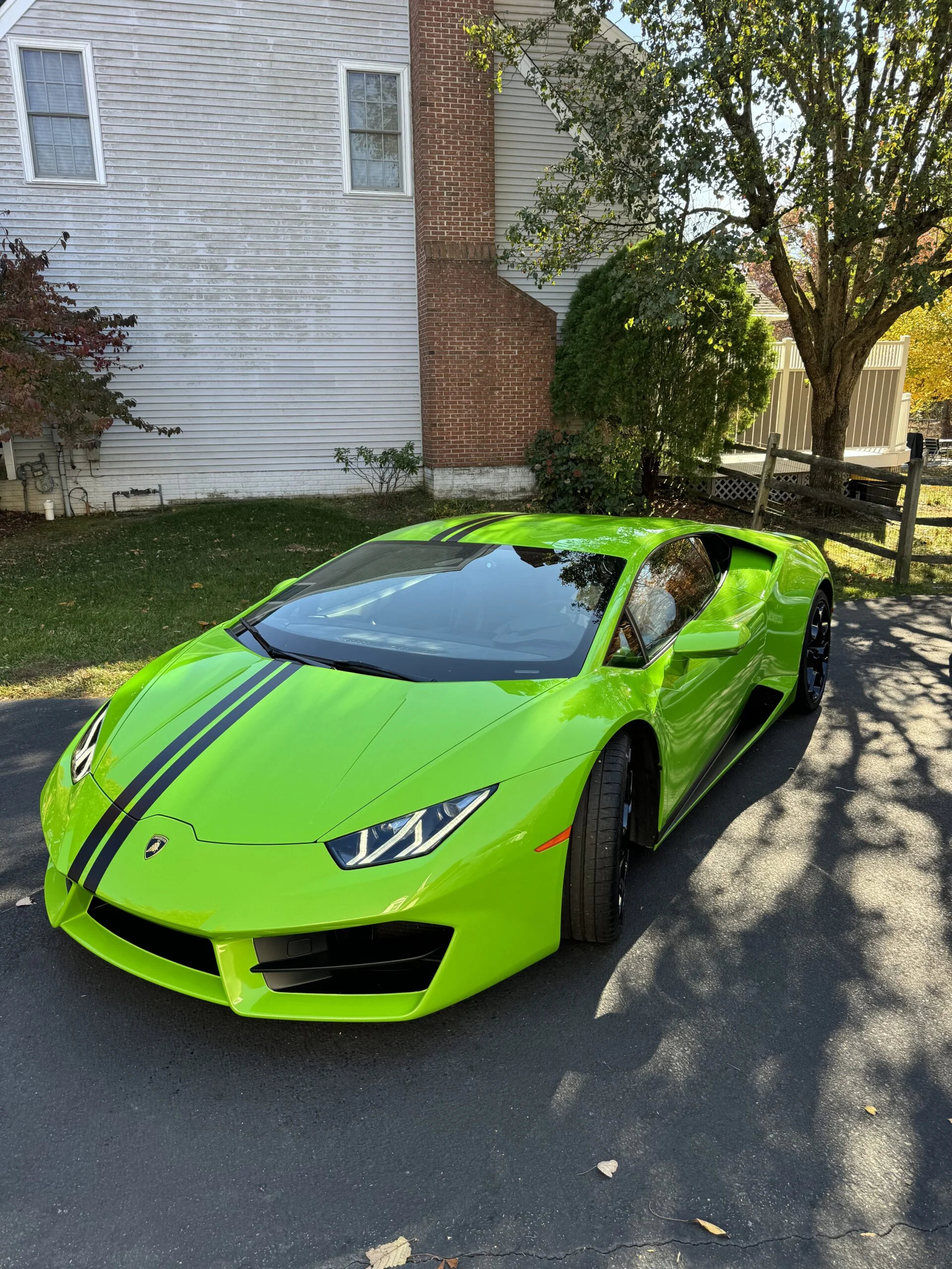 Green Lamborghini Huracan after a mobile detail